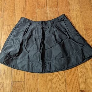 * Black mini skirt with pockets!